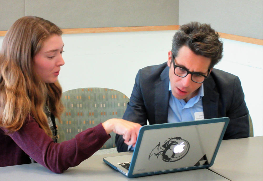 Joseph J. Capista working with students